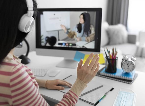 A photo showing a student studying in a cozy home environment